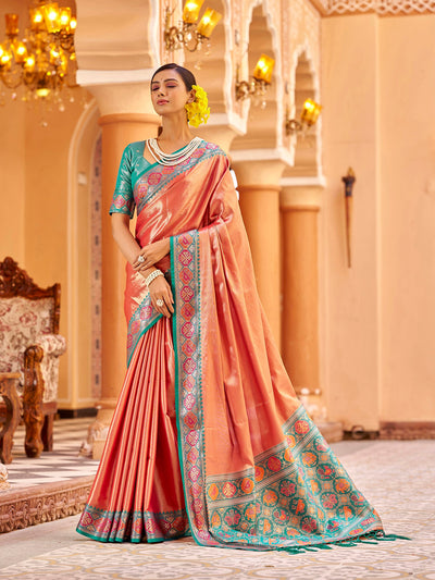 Experience timeless elegance with Elora’s Coral Pink Banarasi Saree, crafted in Zari Tissue and Jacquard weave perfect for weddings, festivals, and special occasions.