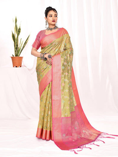 Model draped in a luxurious Beryl Green Floral Soft Silk Banarasi Saree featuring intricate handwoven floral motifs and rich zari detailing, ideal for festive occasions, weddings, and traditional celebrations. Elegant soft silk fabric with Banarasi craftsmanship in a vibrant green shade.