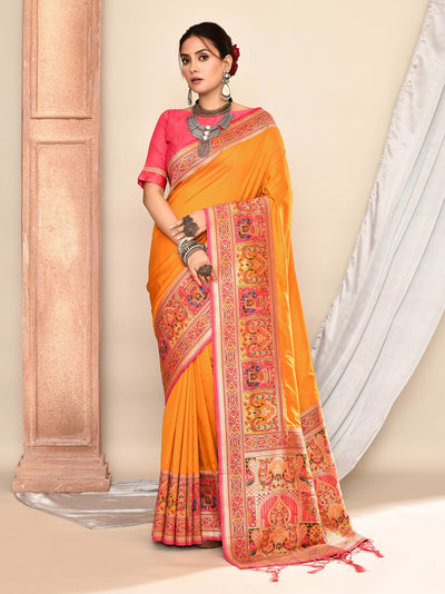 Carrot Mustard Plain Weaving Soft Silk Banarasi Saree featuring rich handwoven soft silk fabric with minimal plain weave design, vibrant carrot mustard color, and traditional Banarasi craftsmanship ideal for weddings, festive occasions, haldi ceremonies, and ethnic celebrations.