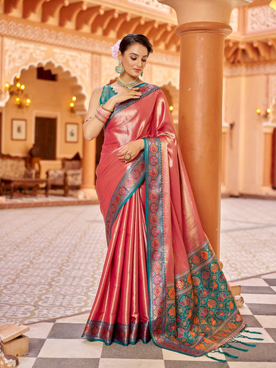 Elora Coral Peach Zari Tissue Solid Banarasi Silk Saree featuring luxurious woven jacquard work, elegant solid texture, and rich traditional craftsmanship ideal for weddings, festive occasions, and designer ethnic wear looks.