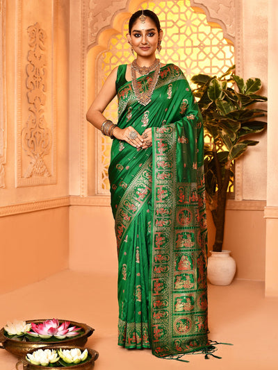 County Green Woven Soft Silk Baluchari Saree featuring traditional handwoven Baluchari motifs, crafted in luxurious soft silk fabric. The elegant county green hue, detailed pallu design, and smooth drape make it perfect for weddings, festive occasions, and traditional Indian celebrations.