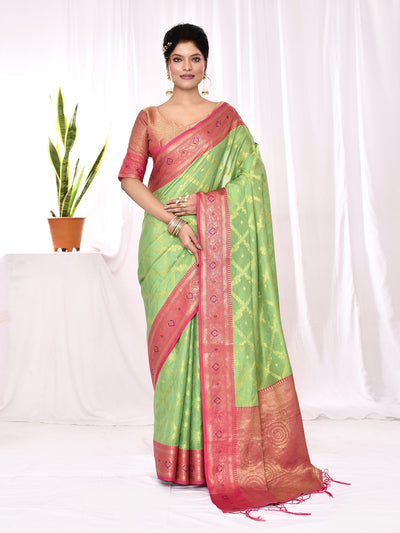 Drab green chex woven soft silk Banarasi saree featuring traditional handwoven design, rich ethnic patterns, and luxurious soft silk fabric perfect for festive occasions, wedding functions, and elegant traditional Indian wear.