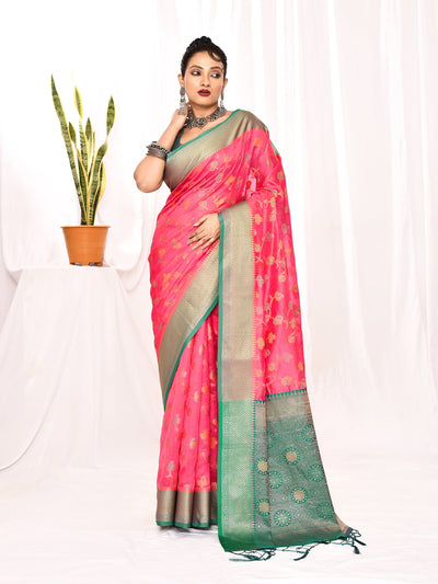 Beautiful brink pink soft silk Banarasi saree adorned with delicate floral designs, offering a luxurious feel and elegant drape. This timeless piece of Indian ethnic wear is comfortable yet opulent, making it an ideal choice for women attending parties, engagements, or cultural gatherings.