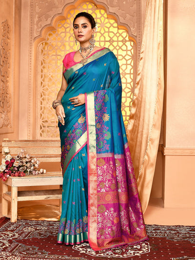Elegant French Blue Floral Soft Silk Banarasi Saree featuring intricate golden zari work and traditional weaving, perfect for weddings, festive occasions, and ethnic celebrations. Lightweight and luxurious Banarasi silk saree with floral motifs and rich pallu design.