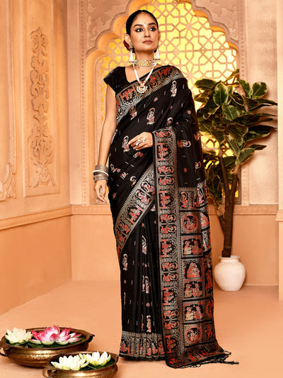 Elegant Slate Black Woven Soft Silk Baluchari Saree featuring intricate traditional motifs and fine craftsmanship, perfect for weddings, festive occasions, and cultural celebrations. This luxurious handwoven saree showcases timeless Baluchari weaving on premium soft silk fabric.